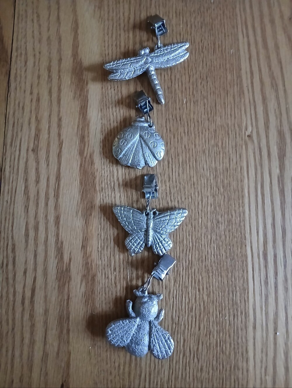 Silver tone decorative insect themed tablecloth weights